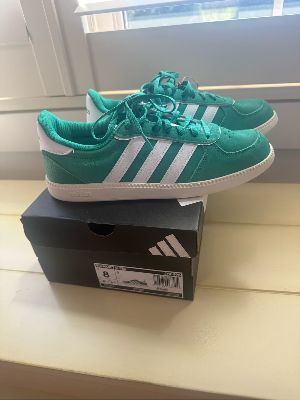 adidas women’s Green Court-Style Sneakers with White Stripes